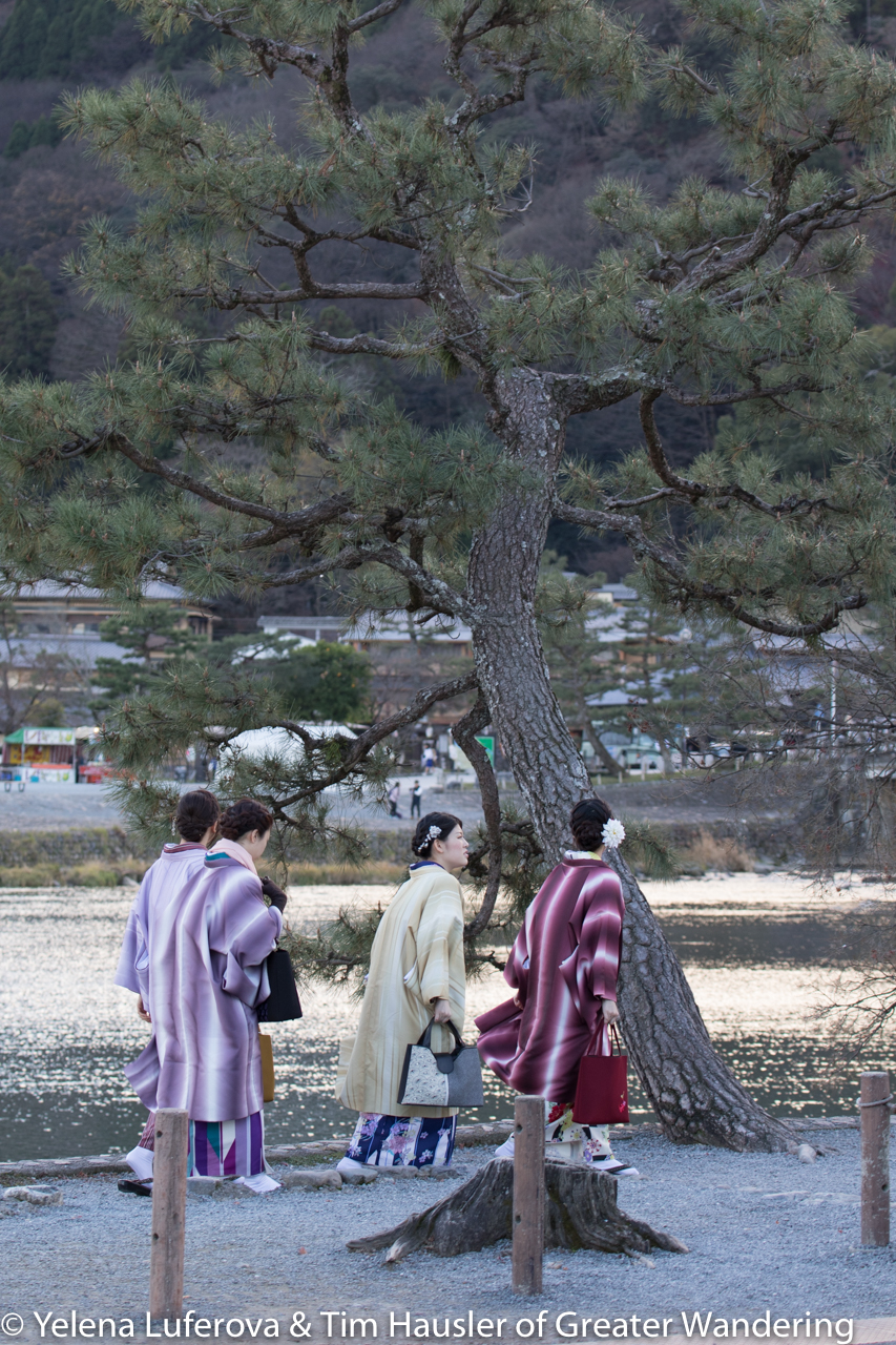 Kimono clad women walk toward an unknown destination
